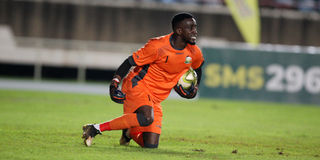 Harambee Stars goalkeeper Arnold Origi in action against Comoros