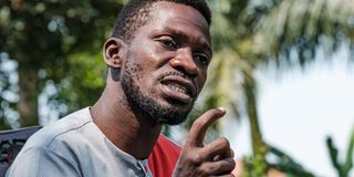 Robert Kyagulanyi, popularly known as Bobi Wine, addresses the media at his home in Wakiso, Uganda on January 8, 2021.