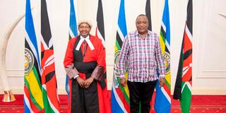 Uhuru with Justice Kathurima M'Inoti