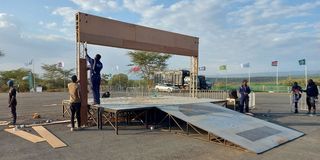 Workers put up the start and finish ramp at the Kenya Wildlife Research Institute in Naivasha