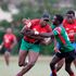 Kenya Simbas Vincent Onyala charges past teammate Geoffrey Ominde