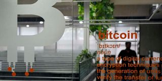 The cryptocurrency symbol of Bitcoin