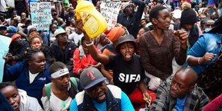 Kenyans protest outside the Office of the President in Nairobi on July 7, 2022, over the high cost of living.