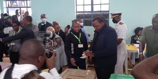 President Uhuru Kenyatta casting his vote