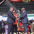 President William Ruto when being handed the instruments of power by former President Uhuru Kenyatta.