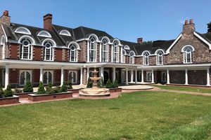 The nine-bedroom palatial mansion bought by Faith Newton