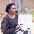 Gone without a trace: Mrs. Susan Wangeci holding a poster of her missing grandchild-Shakilla Kangethe Munyaka