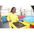 Evelyn Nekesa on her blacksoldier fly farm in Eldoret with some of her products.
