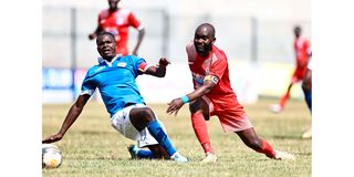 Sofapaka defender David Nshirimimana vies for ball with Posta Rangers forward Timothy Otieno