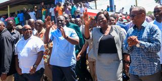 President William Ruto and Homabay Governor Gladys Wanga wave to the people of Homabay County