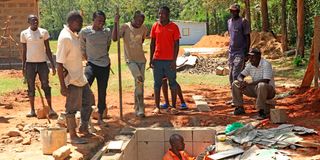 Masons preparing the graveyard of the late Prof George Magoha's brother Professor Richard Magoha