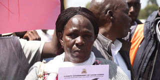 A teary parent protesting after being shortchanged in the controversial Finland, Canada study programme in Uasin Gishu County