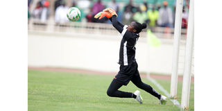 Harambee Starlets goalkeeper Annedy Kundu saves a penalty