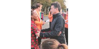 Faith Kipyegon and Sebastian Coe