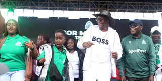 Information Communication and Technology Cabinet Secretary Eliud Owalo (second right) with Gor Mahia Chairman Ambrose Rachier