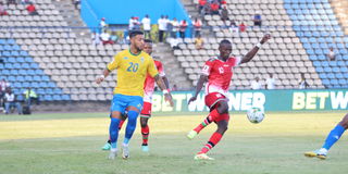 Kenya's Kenneth Muguna (left) in action against Gabon