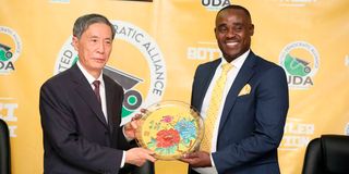 Jiang Xinzhi and Cleophas Malala