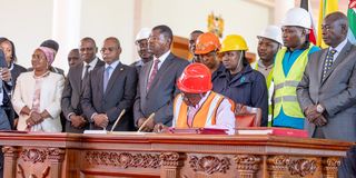 President William Ruto assents to the Affordable Housing Bill at State House, Nairobi on Tuesday.