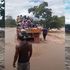 An attempt by some locals to cross the flooded river in a lorry ended in disaster when the vehicle was swept away.