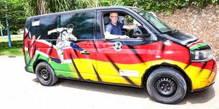 German Ambassador to Kenya Sebastian Groth test drives a Kenyan- German Branded Van