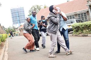 Edith Wanjiku (left) at the City Mortuary in Nairobi after viewing the body of her son