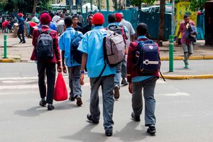 High school students walk home